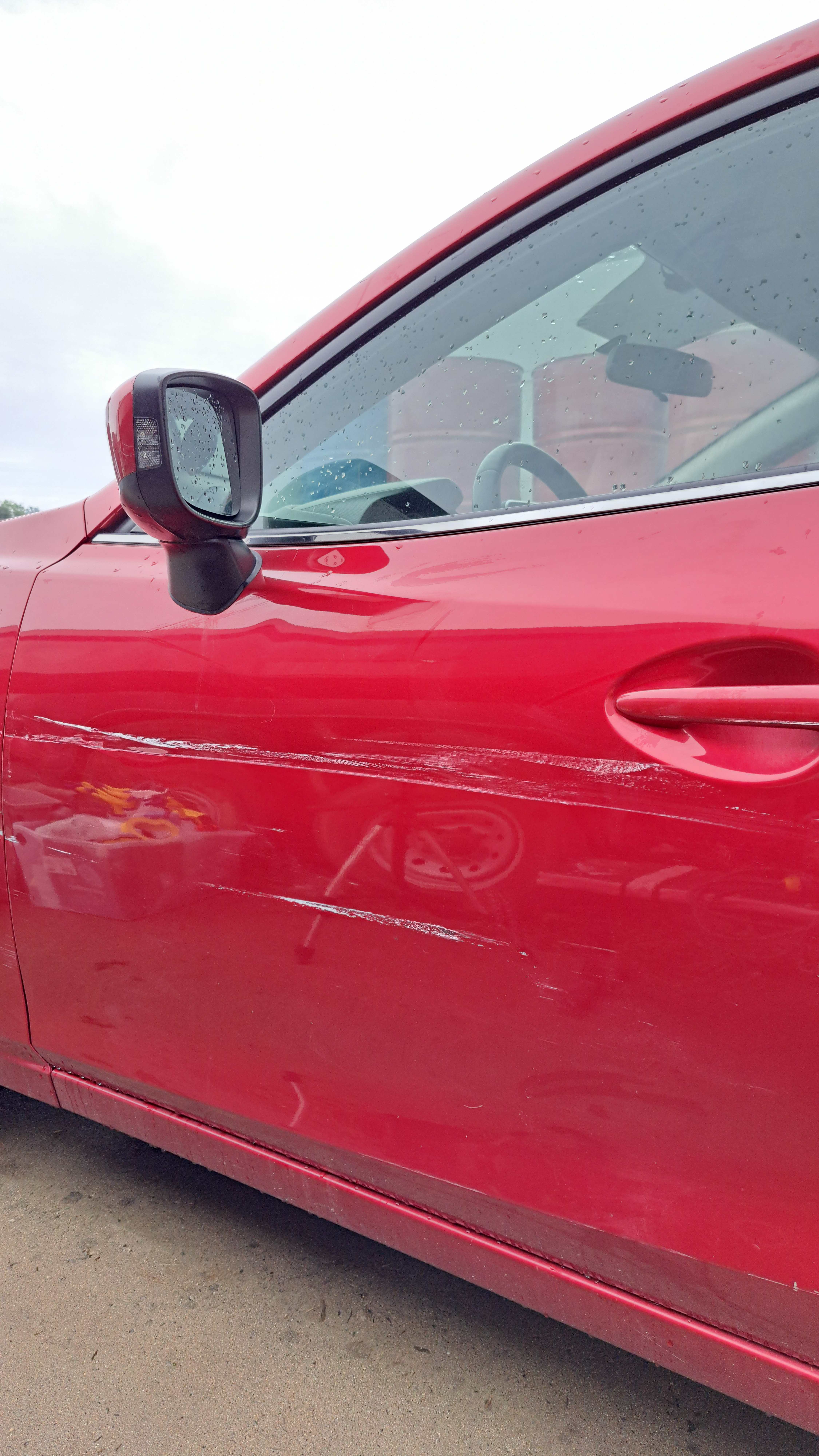 Scratch & Scuff Removal — Mazda — before